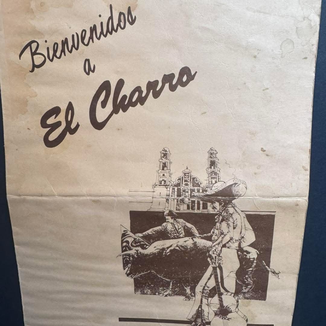 Vintage Bienvenidos a El Charro menu page with mariachi and bull illustration