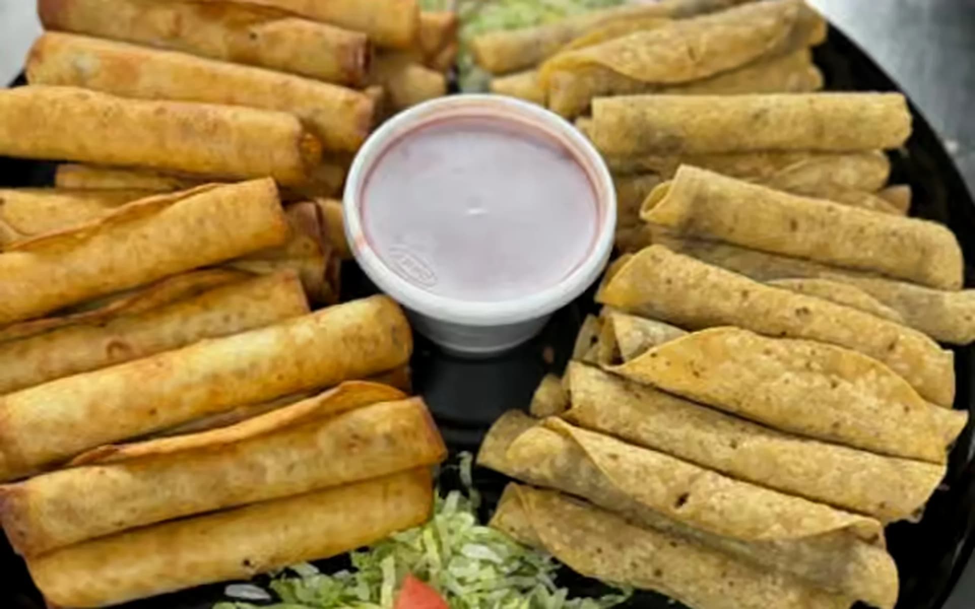 Rolled taco and Sonora taco tray for El Charro Cafe catering